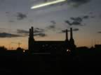 A power station, we think it is Battersea from the south taken from the train, you can see a reflection of the lights in the window (18kb)